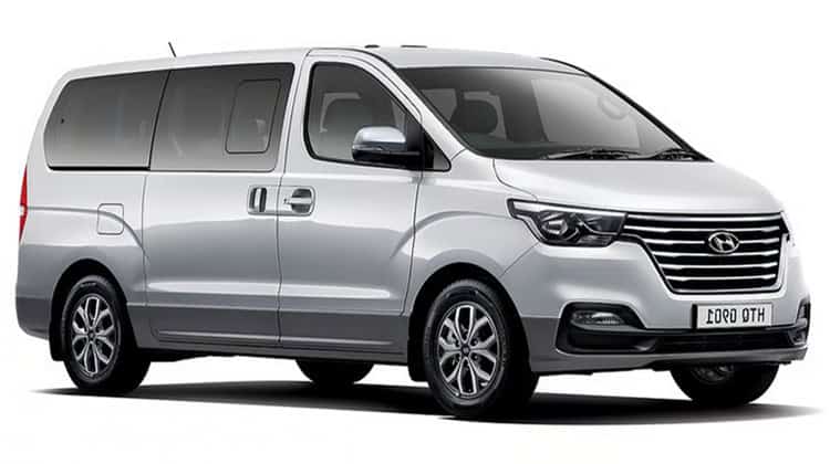 Silver passenger van side view