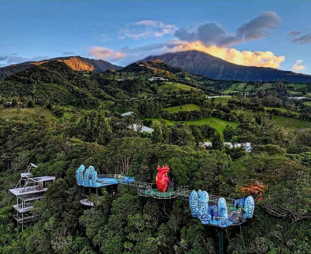 Mountain landscape with heart-shaped structure in forest