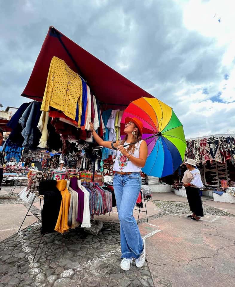 Woman shopping at colorful outdoor market